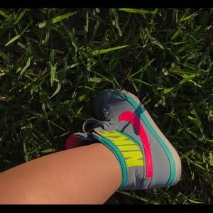 Neon pink, teal and green Nike high tops